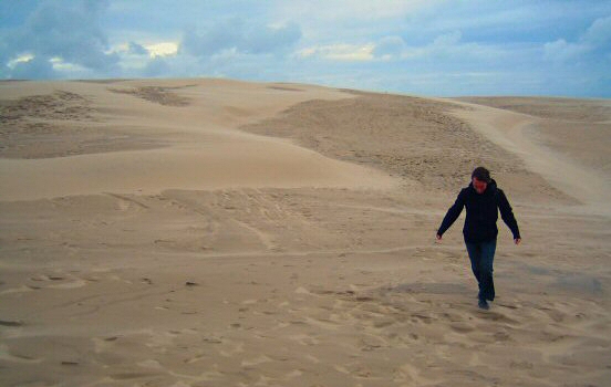 Walking across sand dunes