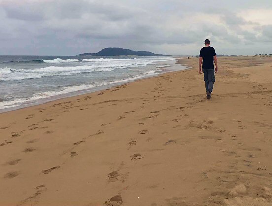 Reine walking the beach outside St Lucia